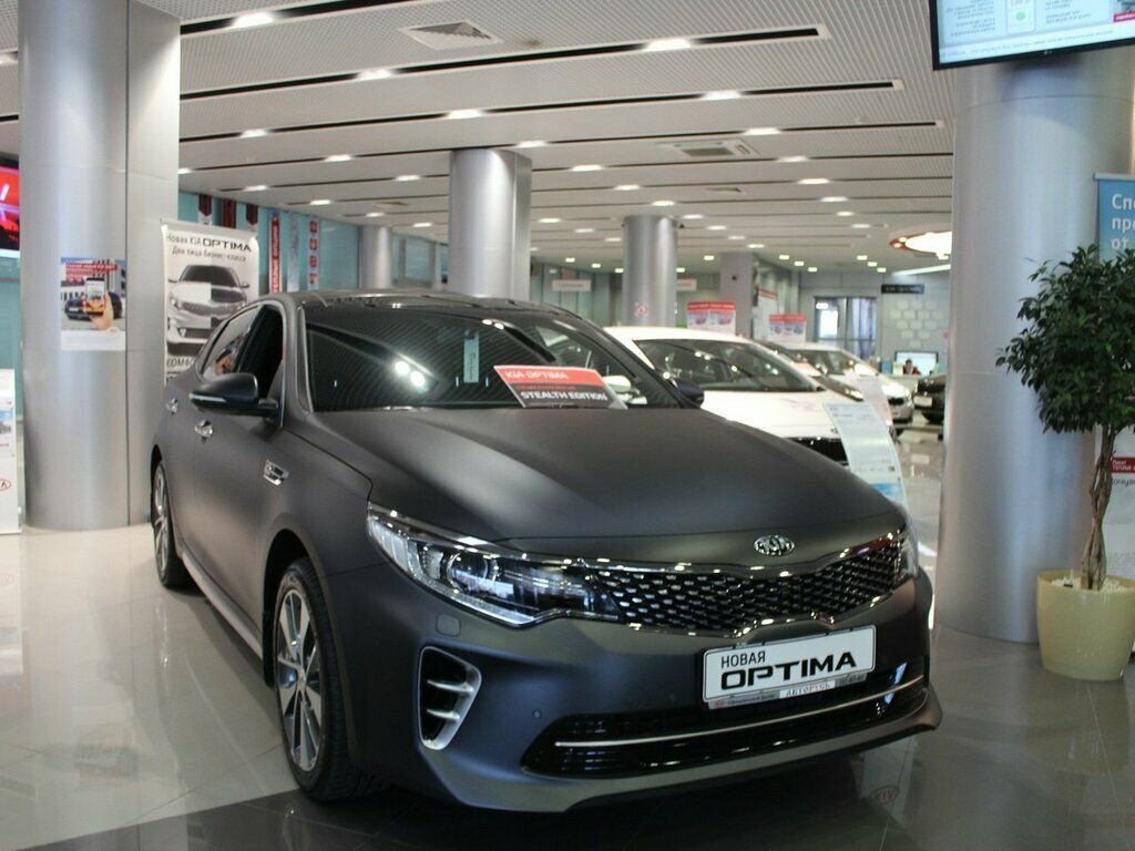 Нова авто москва. Киа к6. Kia Motors Uzbekistan avtosalon. Kia k5 зеленая. Kia 300.