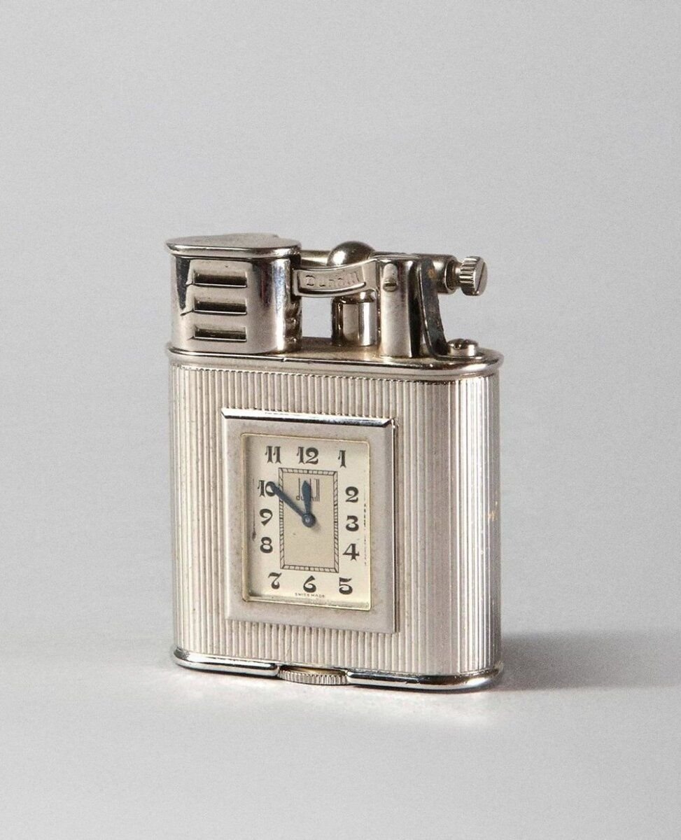 Часы lighter. Зажигалка Данхилл турбо. Зажигалка часы Dunhill. Зажигалка Dunhill unique Tourbo Sport. Зажим для денег Данхилл.