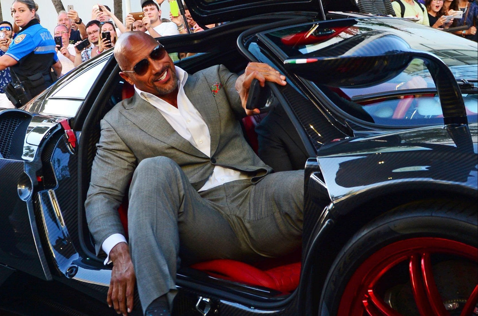 Riding in my sports car. Дуэйн Джонсон кар. Dwayne Johnson cars. Дуэйн Джонсон на Rolls Royce. Дуэйн скала Джонсон в машине.