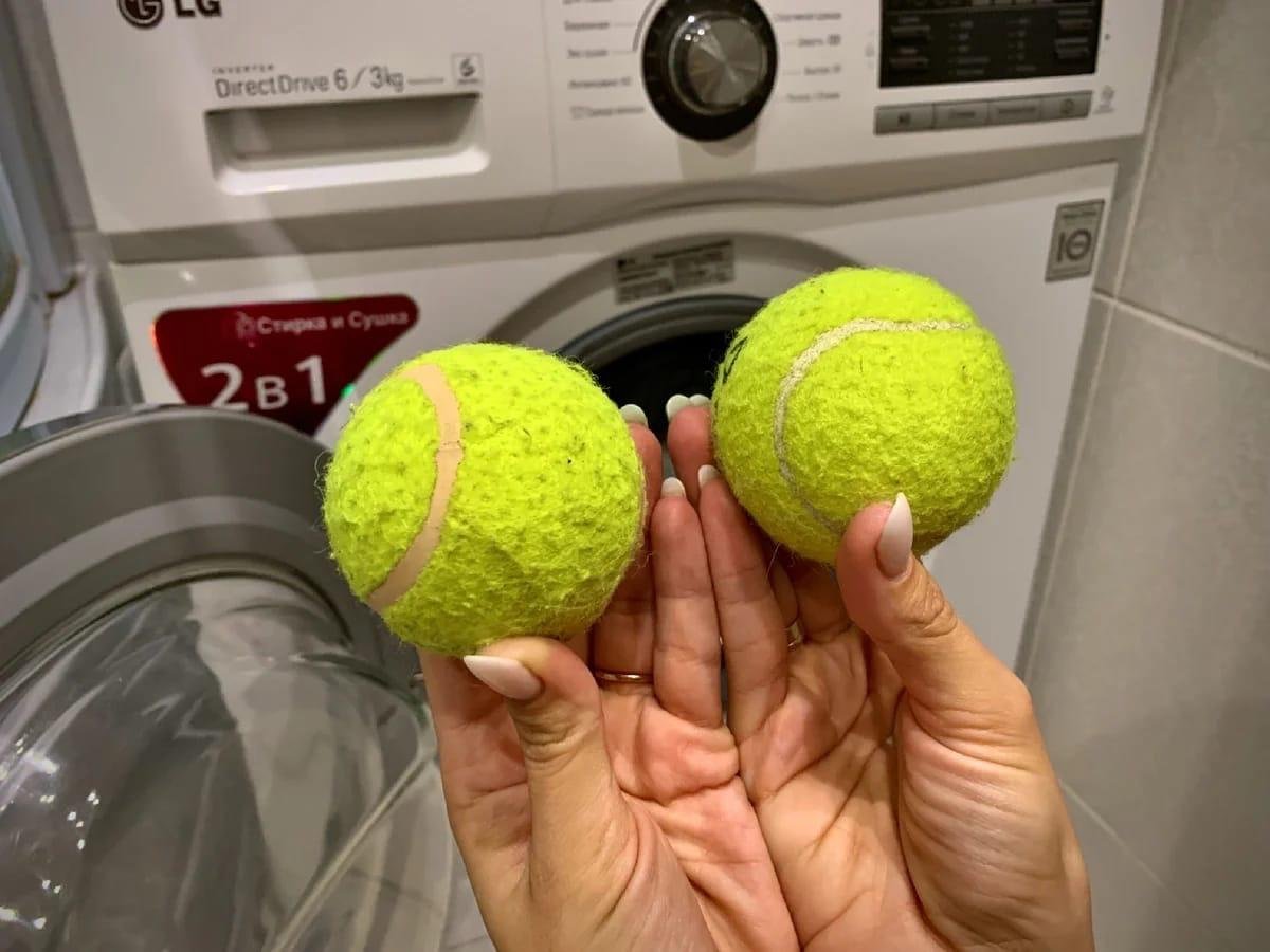 Как стирать пуховик в стиральной машине с мячиками теннисными правильно