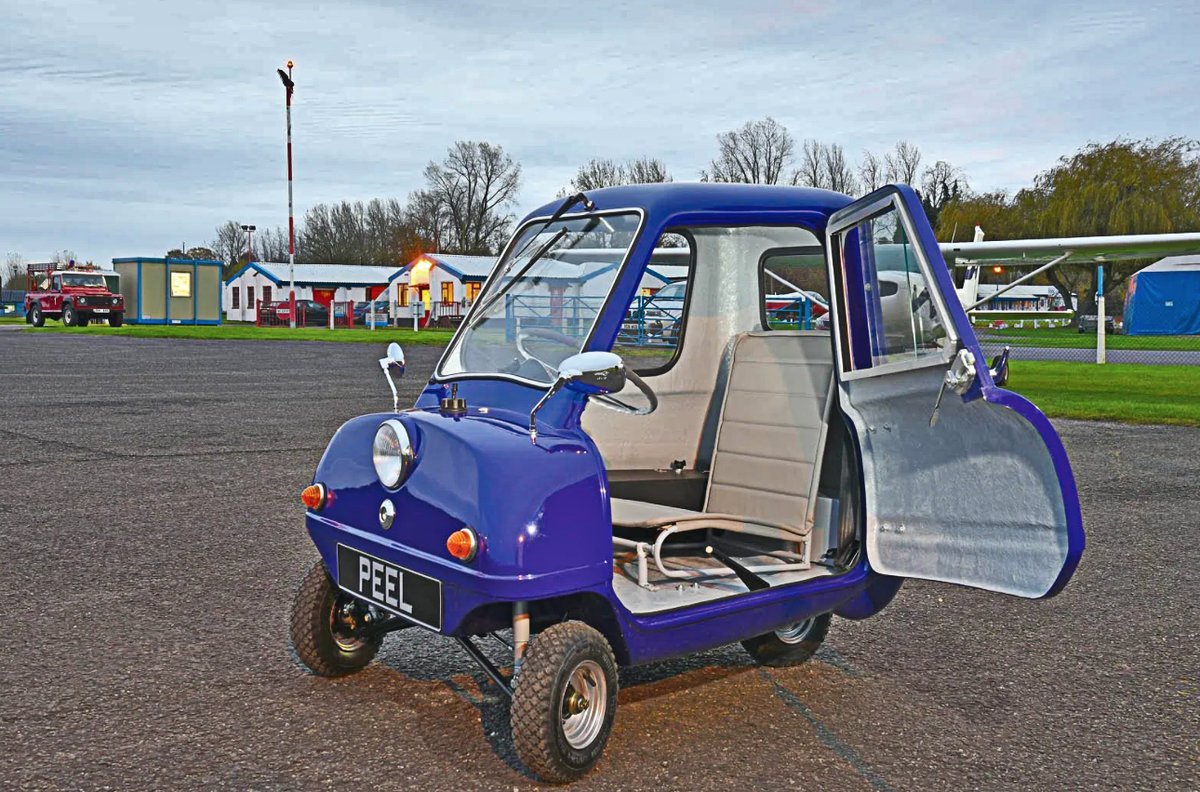 Машина п. Автомобиль Peel p50. Пил пи 50 Peel p50. Трехколесный Peel p50. Peel 50 машина.