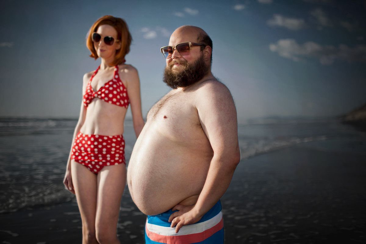 Жирный мужчина и худая девушка