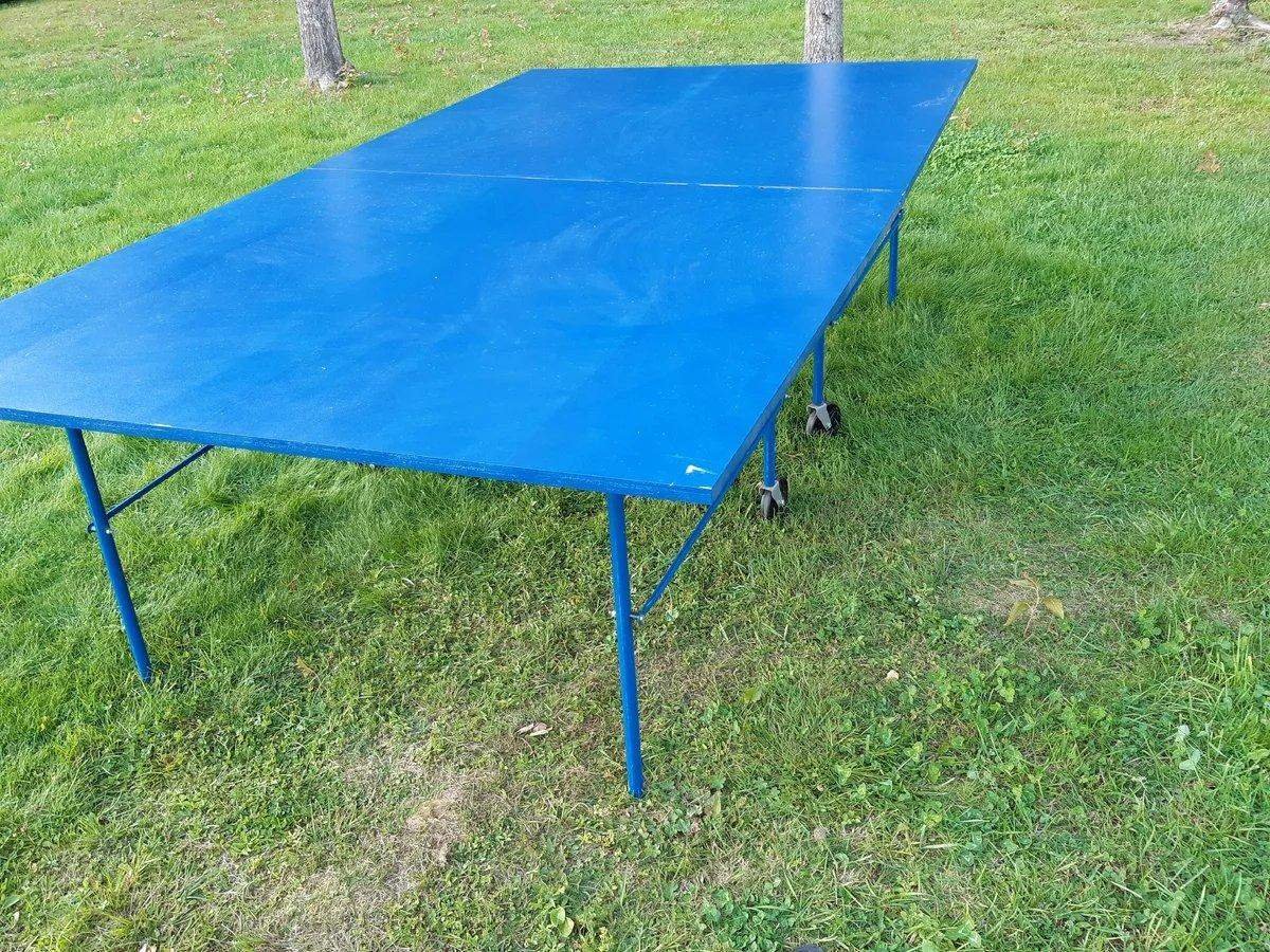 Спортмастер теннисный. Теннисный стол Orinoco. Изогнутый теннисный стол. Сломался теннисный стол. Теннисный стол Mad in Germany.