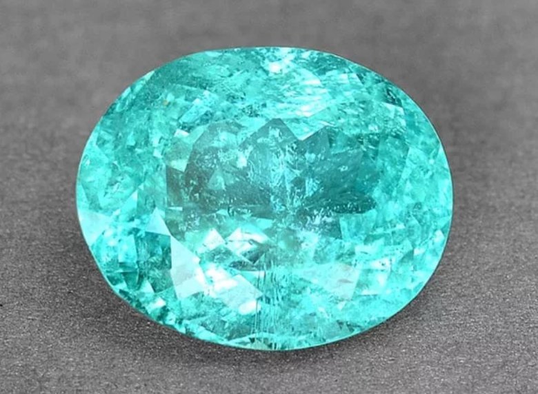 Турмалин параиба. Камень турмалин индиголит. Турмалин голубой камень. Камни сапфир турмалин. Турмалин параиба камень.