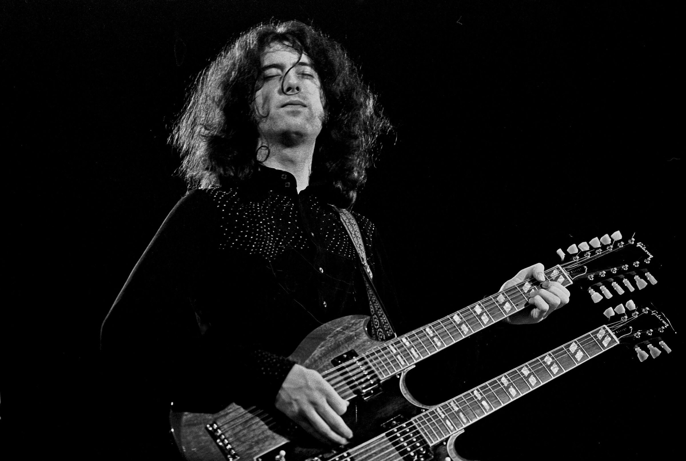 Мир роков. Джимми пейдж. Группа led Zeppelin Джимми пейдж. Гитарист лед Зеппелин. Джимми пейдж гитарист.