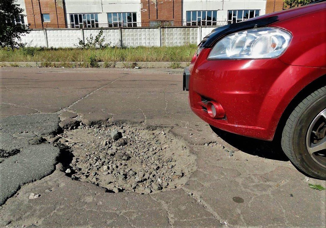 Картинка колесо в яме