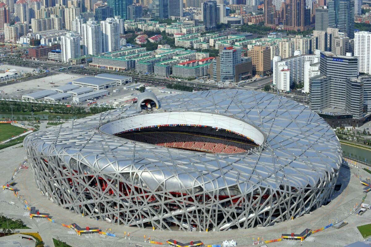 Стадион гнездо. Пекинский национальный стадион Птичье гнездо. Олимпийский стадион в Пекине Птичье гнездо. Стадион Ласточкино гнездо в Пекине Бионика. Стадион «Птичье гнездо» (Пекин, Китай).