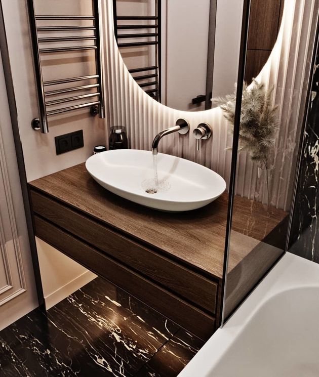 Крайне удачный проект ванной комнаты от дизайнера. Стиль и утончённость.